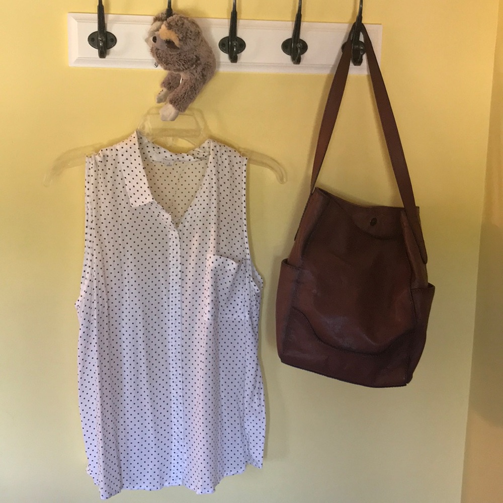 Sleeveless black and white polka dot top